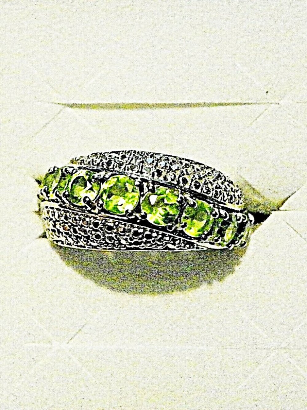 Peridot ring (2.35cts) in Platinum over brass sz 7